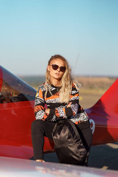 istock Model posing in sport outfit and sunglasses 1286912391