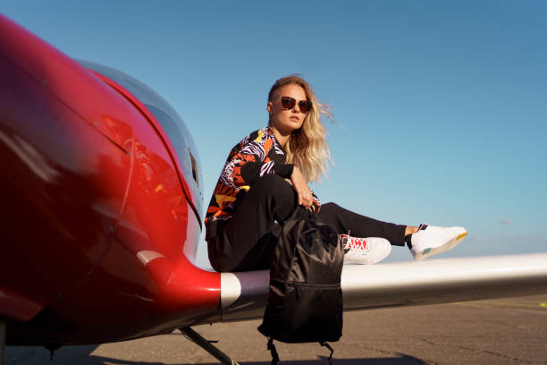 istock Model posing in sport outfit and sunglasses 1286912399