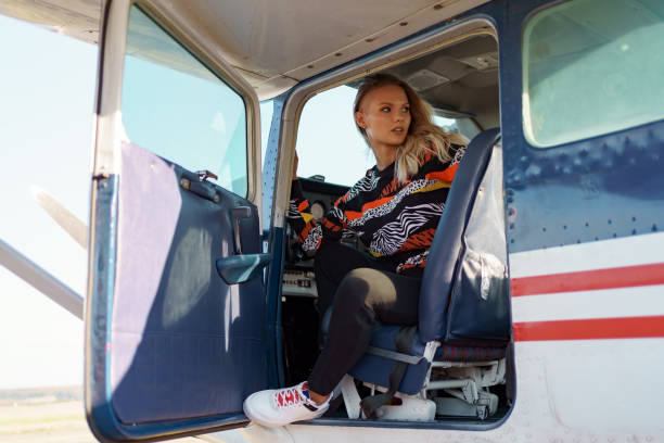 istock Young woman piloting a plane 1286912401