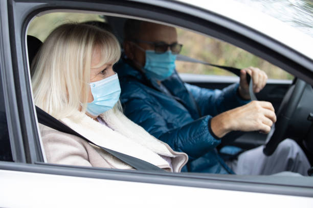 istock Mature Couple Inside the Car 1286912971