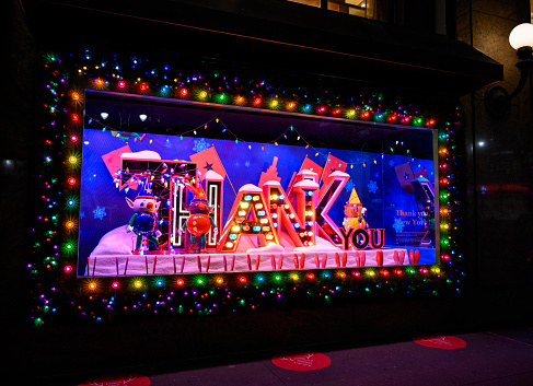 New York, New York, USA - November 20, 2020: One of the Macy's Christmas Holiday windows with THANK YOU theme honoring frontline workers.