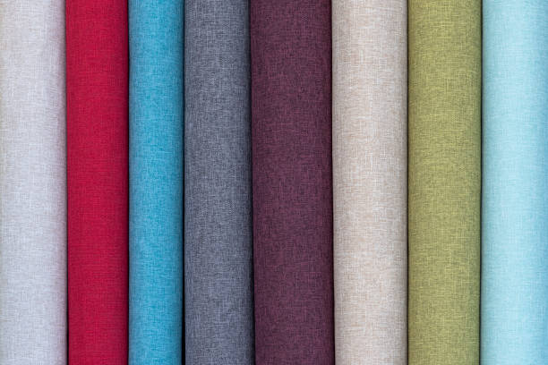 istock Closeup detail of multi color fabric texture samples. 1286914182