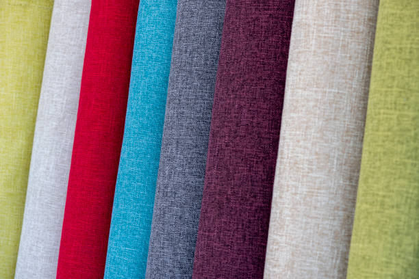 istock Closeup detail of multi color fabric texture samples. 1286914208