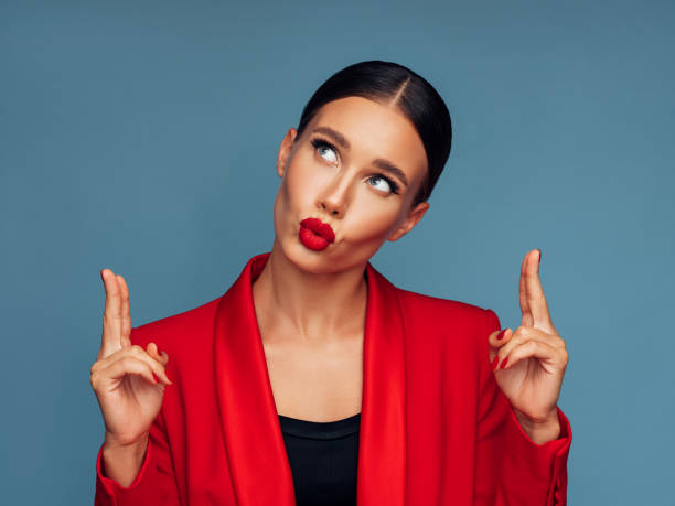 istock Beautiful emotional woman pointing up 1286914383