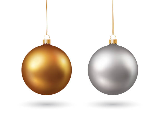 Set of gold and silver colored realistic shiny christmas baubles isolated on white background Set of gold and silver colored realistic shiny christmas baubles isolated on white background gold metal clipart stock illustrations