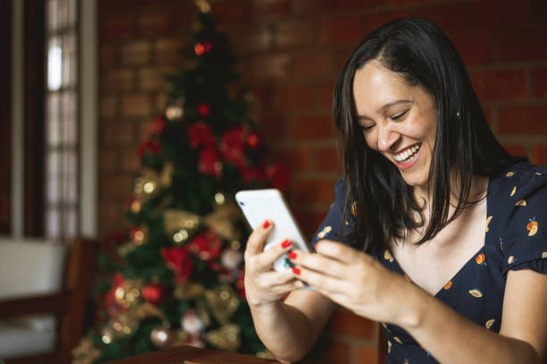 istock Woman chatting by video call at Christmas 1286916028