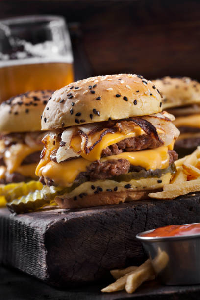 Double Cheese Burger Sliders with Fried Onions, Pickles on a Brioche Sesame Seed Bun