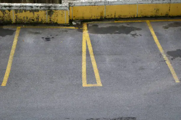 Two parking lots next to each other.,border,line,
