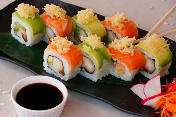 istock sushi rolls with avocado, crab, salmon and soy sauce 1286928267
