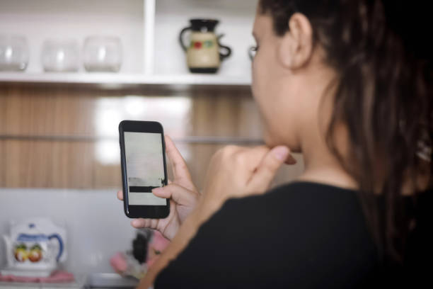 istock Woman ordering food on a food app 1286931439