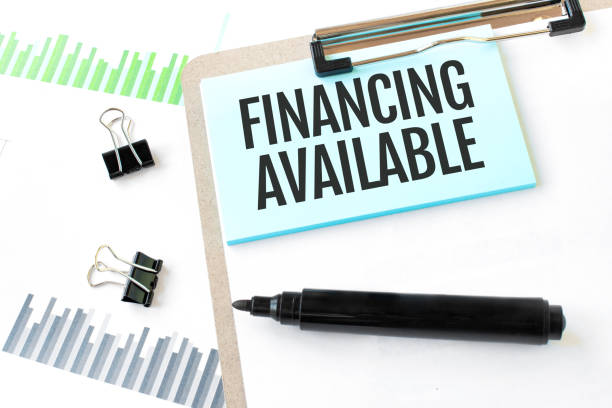 istock On the tablet for the letter text FINANCING AVAILABLE, about lie glasses. The background is reporting. 1286933239