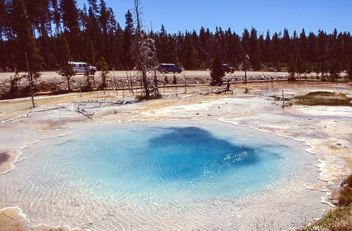 In the Yellostone N.P. in Wyoming there are large turquoise blue lakes of warm thermal water to testify to intense volcanic and geothermal activity.