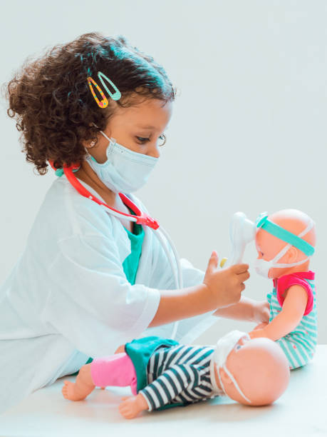 istock A little girl playing the doctor 1286940624