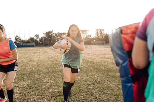 istock Female rugby players sparring on the training 1286942517
