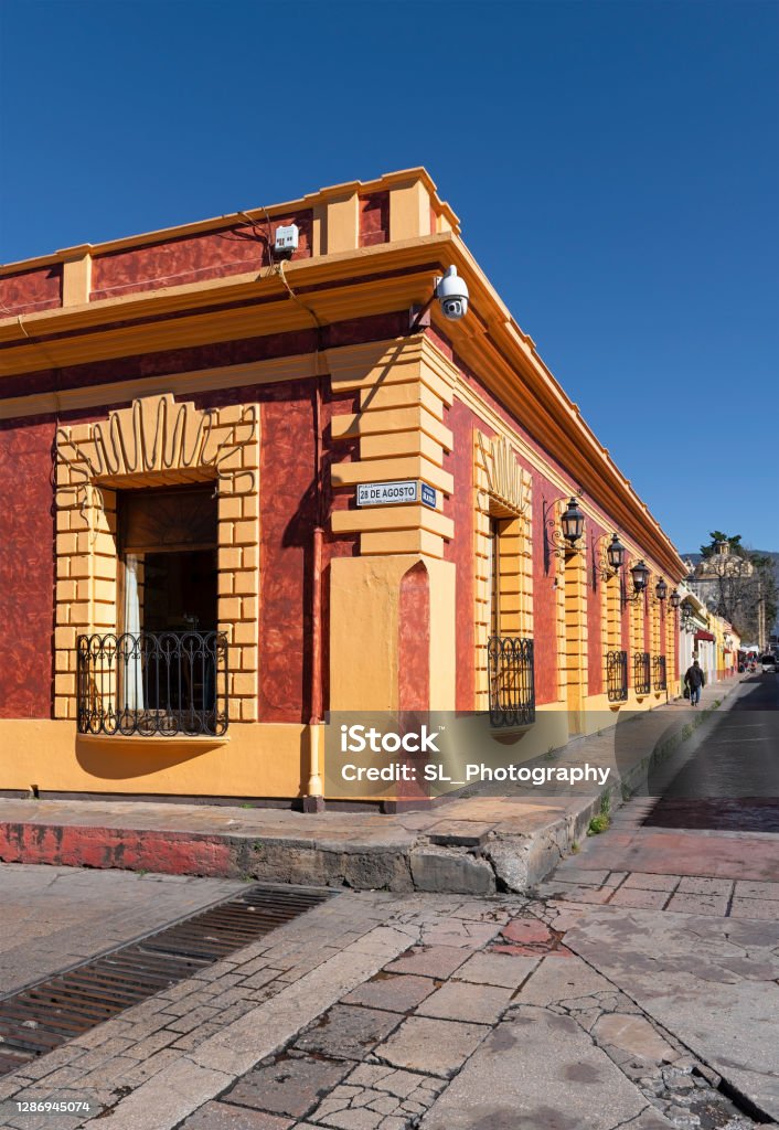 Street Corner, San Cristobal de las Casas, Mexico Street corner with colonial style architecture, San Cristobal de las Casas, Chiapas, Mexico. San Cristóbal de las Casas - Mexico Stock Photo