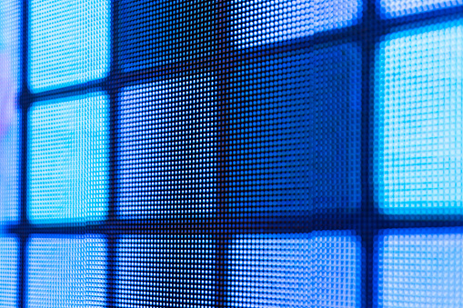 Macro details of a LCD TV screen with red green and blue microscopic lights.