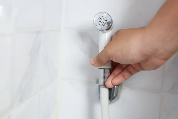 istock White handheld bidet sprayer in toilet bathroom 1286950043