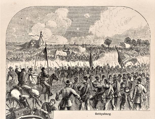 Gettysburg, American Civil War, an Illustrated Battle Scene Union and Confederate soldiers fight at Gettysburg, Pennsylvania. American Civil War. Illustration published in First Lessons in Our Country’s History by William Swinton, A.M. (Ivison, Blakeman, Taylor, & Company, New York and Chicago) in 1872. civil war stock illustrations