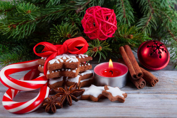 istock Christmas gingerbread cookies with candy cane and christmas tree on wooden rustic table 1286951739