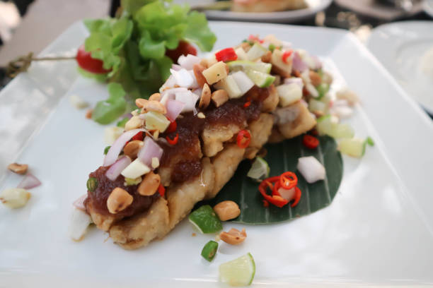 istock grilled bass , grilled fish with spicy dressing 1286956081