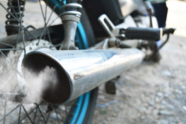 istock Air pollution from vehicle exhaust pipe close up 1286958256