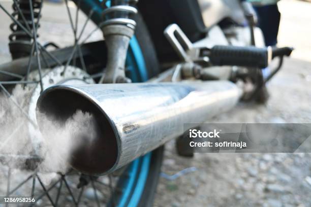 Air Pollution From Vehicle Exhaust Pipe Close Up Stock Photo - Download Image Now - Exhaust Pipe, Motorcycle, Fumes