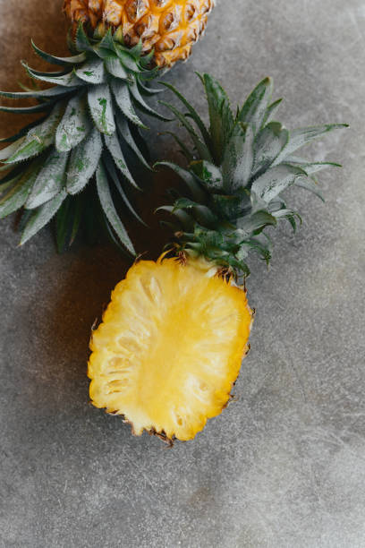 istock Pineapple on a stone table. Tropical Fruits. 1286962975