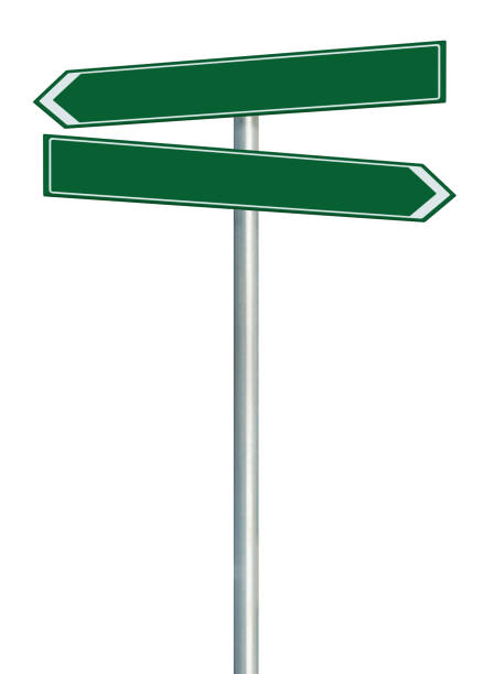 istock Right and left road sign signpost pair, green traffic route direction this way pointer, blank empty copy space, vertical closeup, isolated roadside signage, white traffic arrow frame, grey pole post 1286976452