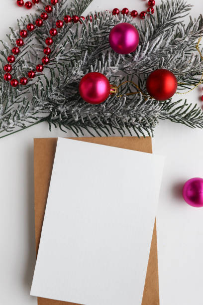 istock christmas card with gift box and christmas tree 1286985692
