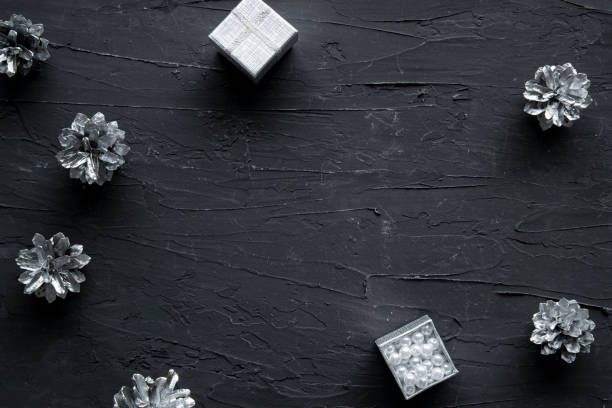 istock Silver bright pine cones frame with empty space for text. Christmas and New Year holidays. 1286991789