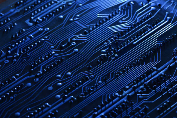 istock Electronic circuit Board of blue color as the technology background 1286993817