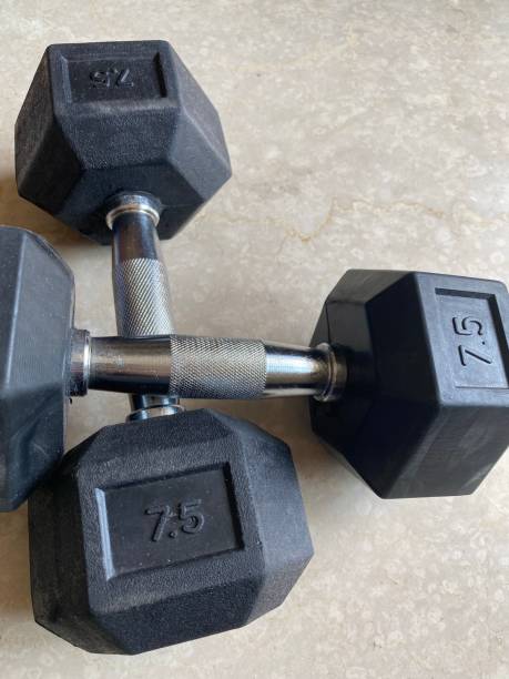 istock Two seven and a half kg dumbbells crossed 1286996951