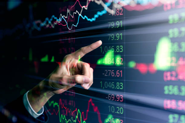 istock Finance business investment strategy competition, business man in suit, data analytic artificial intelligence technology finger point futuristic graph chart stock exchange data finance symbol screen 1286998301