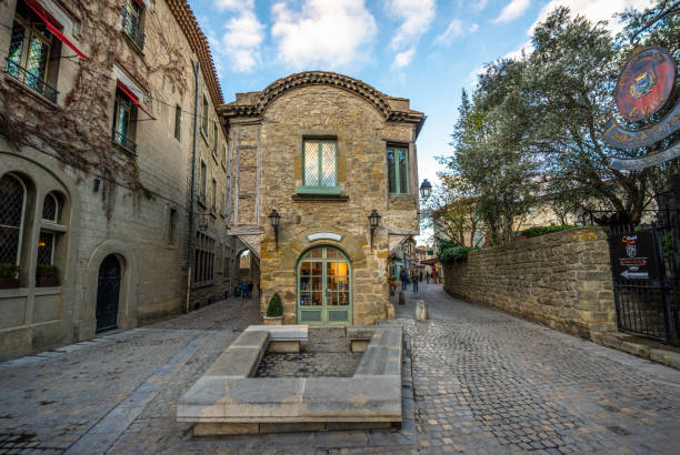 Carcassonne, France - December 08, 2017:Tourists in the streets of La cite de Carcassonne