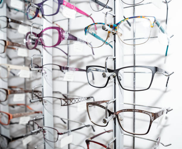 istock Stand with glasses in the store of optics 1287008096