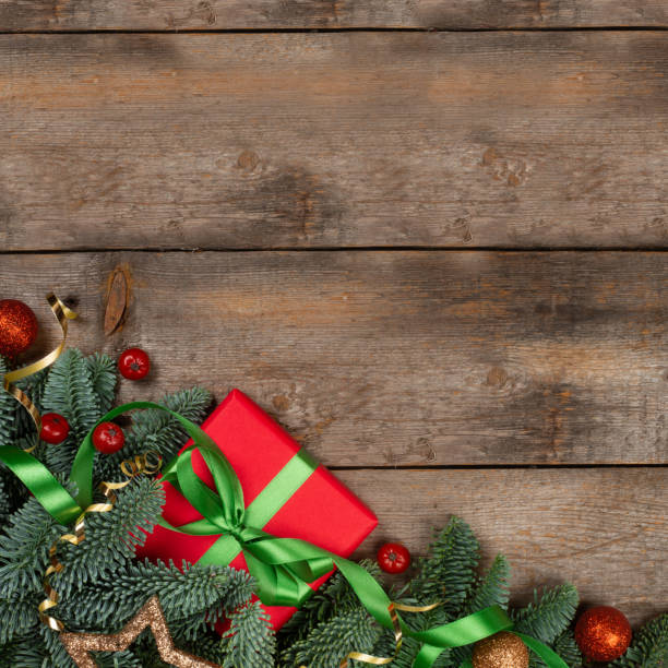 istock Christmas gift and fir branches 1287012675