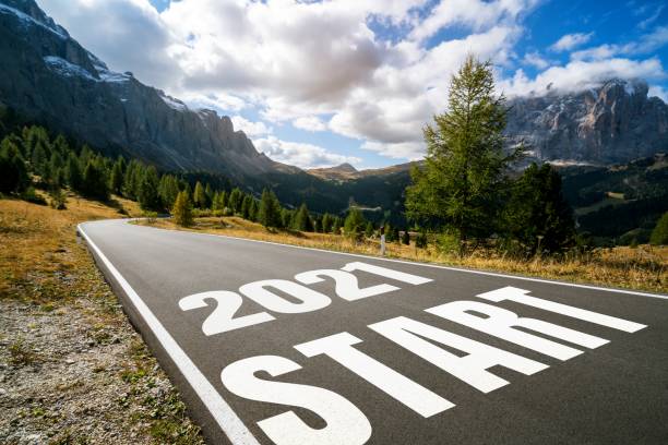 istock 2021 New Year road trip travel and future vision concept . 1287014221
