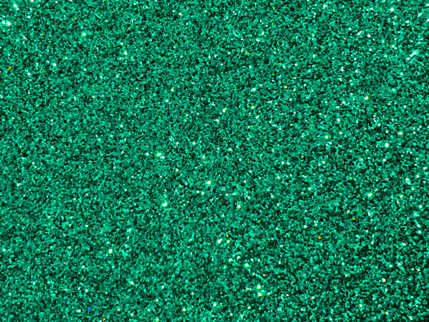 istock Full frame shot of turquoise glitter background 1287015072