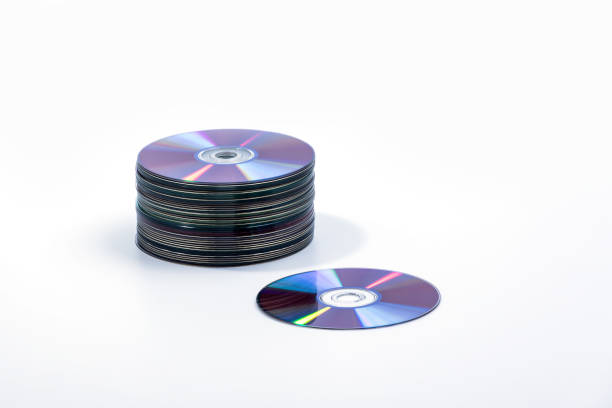 cd and stack of compact discs - dvd stack cd movie imagens e fotografias de stock