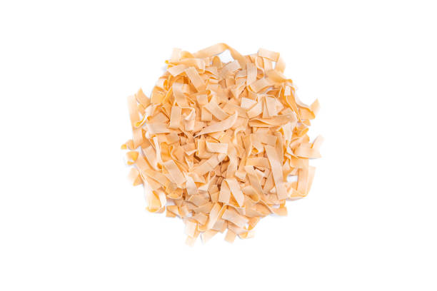 istock Uncooked heap dried pasta tagliatelle 1287017613