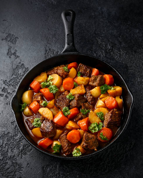 istock Beef Stew with carrot and baby potato in iron cast pan 1287017761