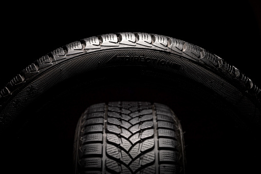 Winter tires isolated on black background high resolution and high quality studio shooting