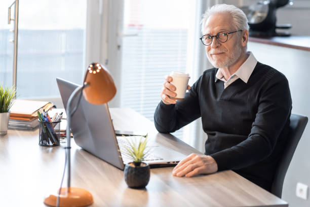 istock Senior businessman having a coffee break 1287023221