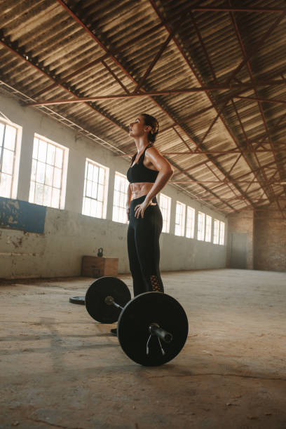 istock Female taking rest after physical training at cross workout space 1287023332