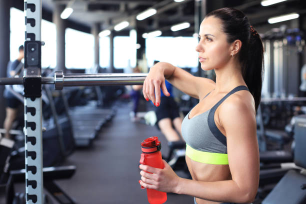 istock Sporty woman resting, having break after doing exercise. 1287026829