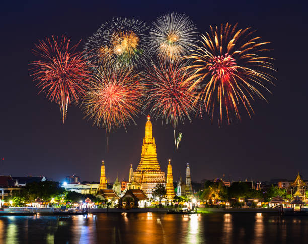 istock Wat Arun with fireworks celebration at night in Bangkok, Thailand 1287028494