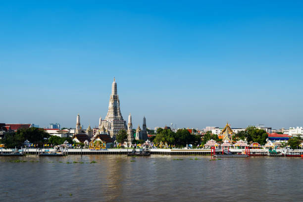 istock Wat Arun Temple and Chao Phraya river with sky in Bangkok, Thailand 1287028509