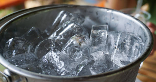 istock Close up ice cubes in bucket. 1287030107