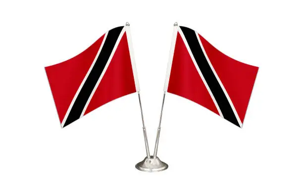 Trinidad and Tobago table flag isolated on white ground. Two flag poles with flags and Trinidad and Tobago flag on the table.