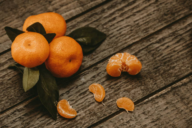 istock Christmas tangerines and tangerine slices 1287033007